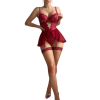 Model wearing the Ruby Flirt red lace bodysuit with a ruffled mesh overskirt
