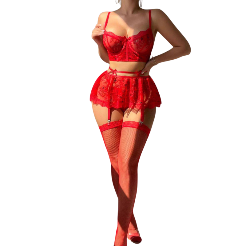 Model wearing the Scarlet Siren red lace garter skirt set with fishnet stockings
